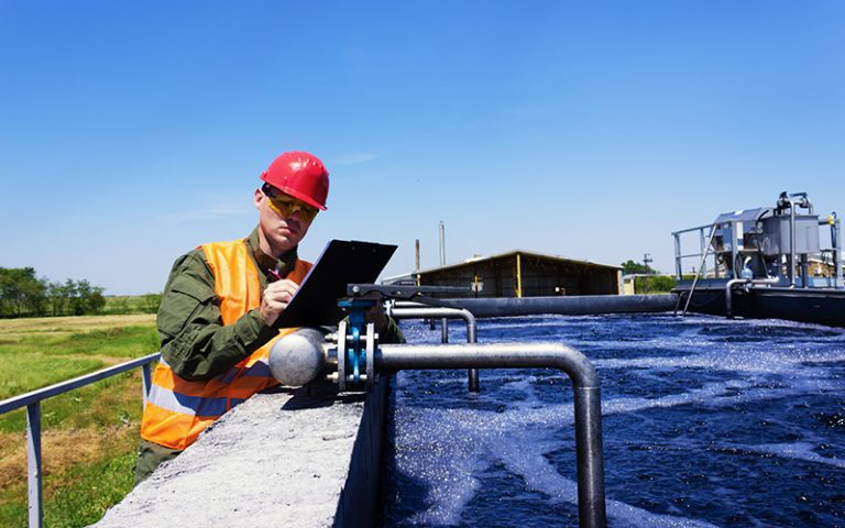 wastewater treatment man testing